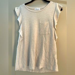 Tan ruffled top purchased from boutique in South Carolina